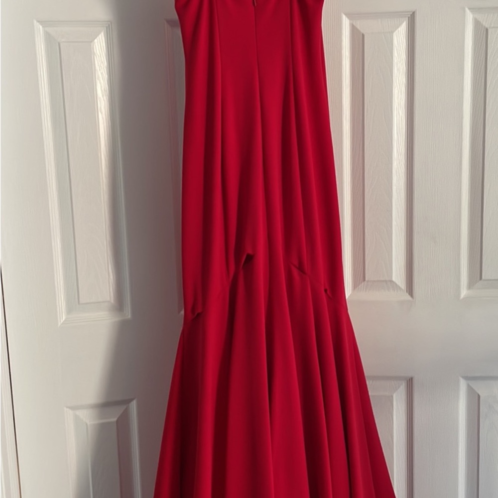 Beautiful prom dress from Bloomingdale’s. Worn once for senior prom.